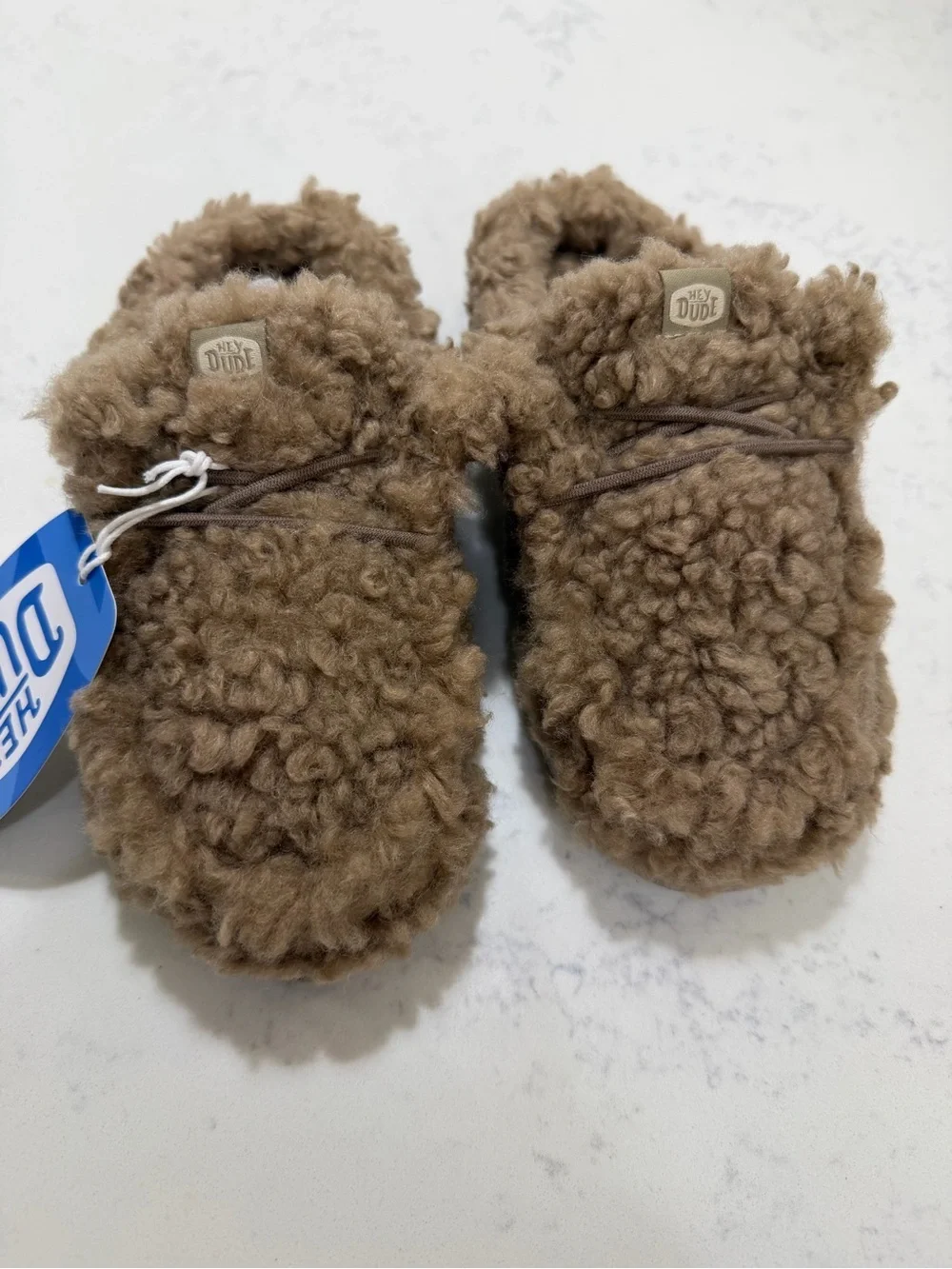 Hey Dude Kids Plush Sherpa Slip-Ons in Camel Brown